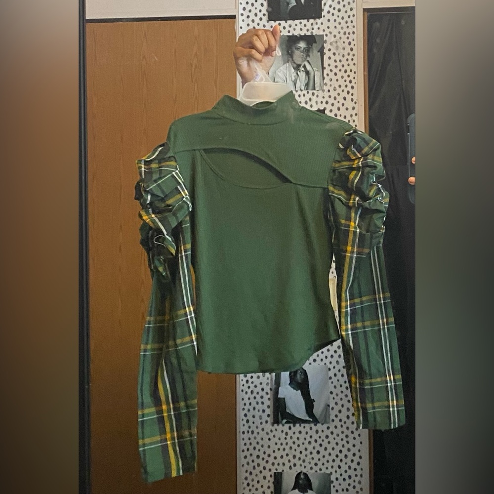 Green blouse.